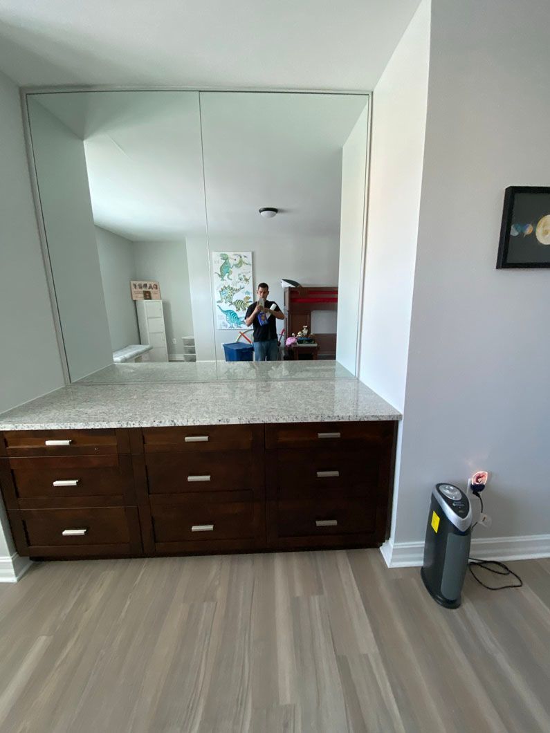 There is a large mirror in the middle of the room.