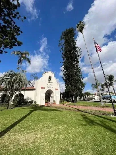 Window Tinting Service-An american flag is flying in front of a building