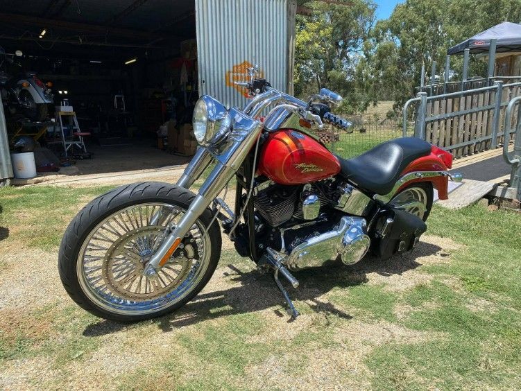 A Red Harley Davidson Motorcycle is Parked — Skids Mechanical Services Pty Ltd in Wagga Wagga, NSW