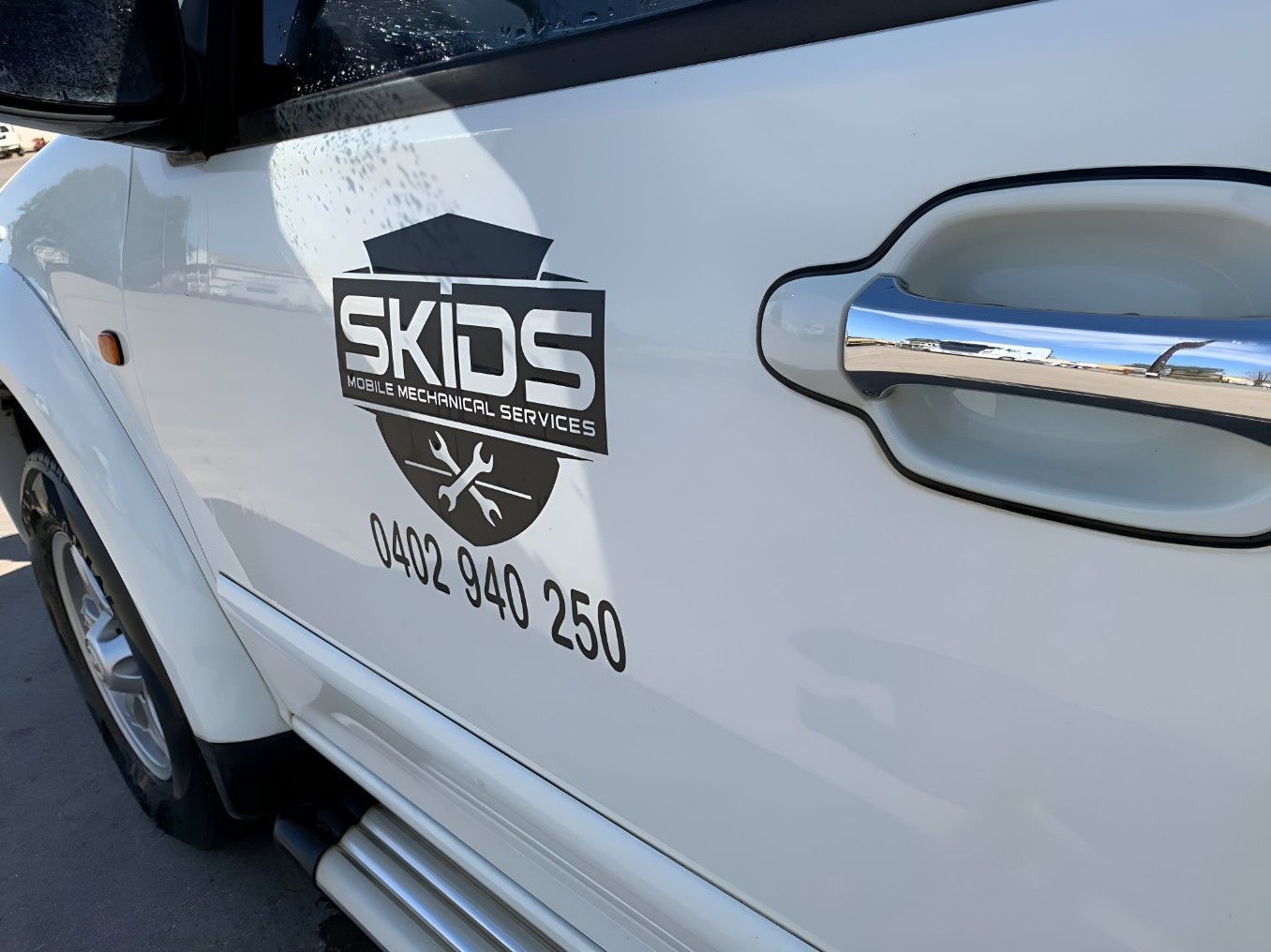 A White Truck With Skids Plumbing Service Written on the Side — Skids Mechanical Services Pty Ltd in Wagga Wagga, NSW