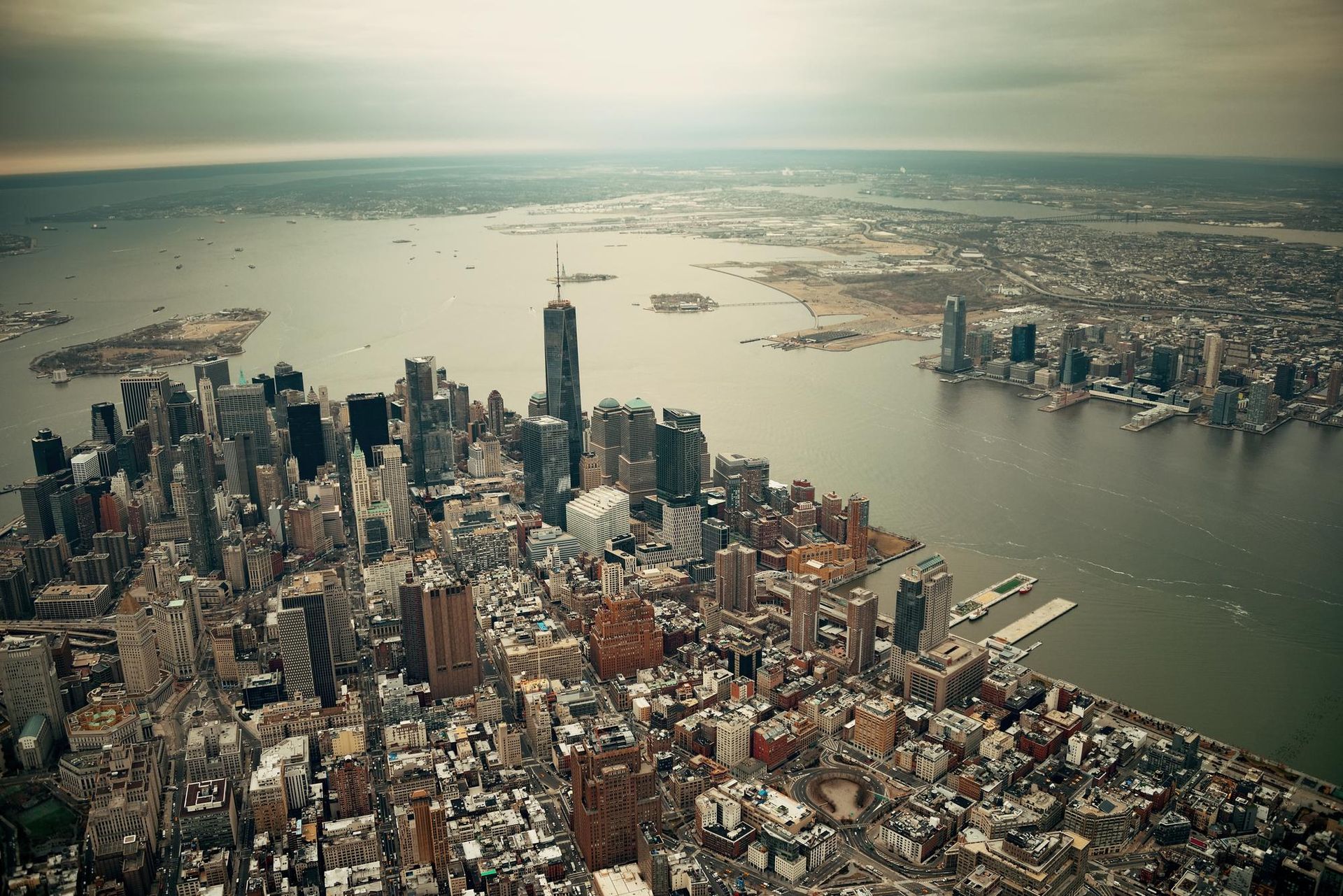 Aerial view of Manhattan skyline and the Hudson River on a hazy day