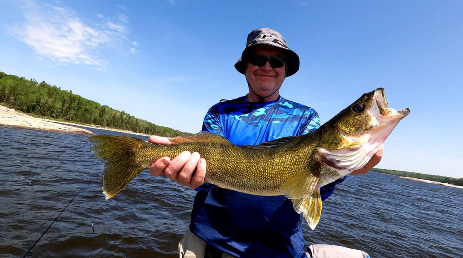 Paul holding a 26 inch walleye caught at Oak Lake Lodge, Ontario, Canada.