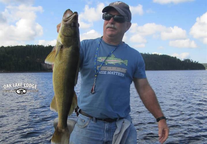 American man enjoying world-class walleye fishing in Canada.