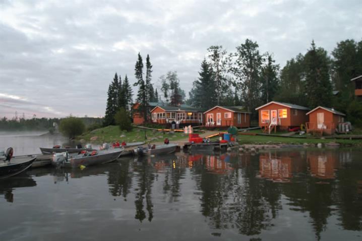 Oak Lake Lodge view of docks and cabins.