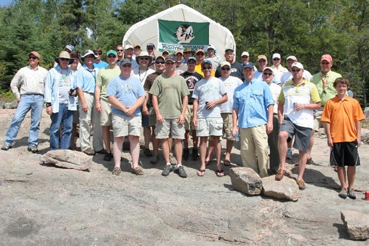 Fly-in fishing business trip group photo.