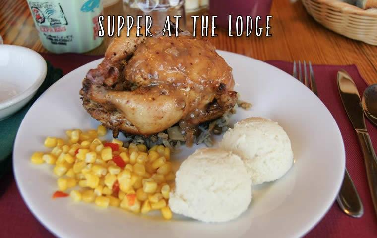 A whole chicken dinner with corn and mashed potatoes served at Oak Lake Lodge in the main dining hall.