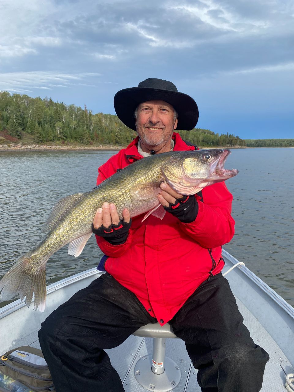walleye fish held by a guest of Oak Lake.