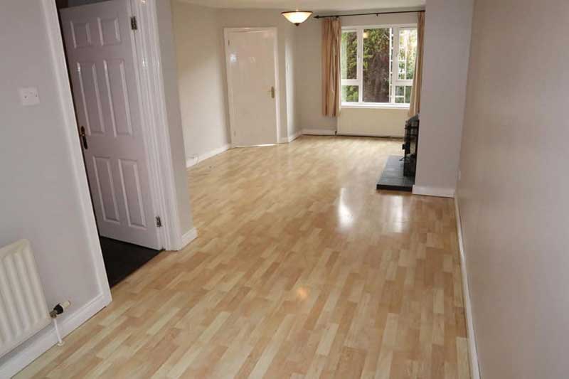 Contemporary, light, bright living space, light wooden floors, white walls