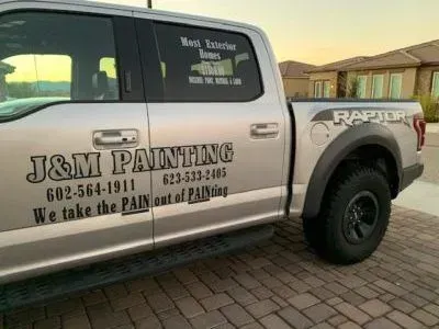 Silver Ford Raptor truck with 