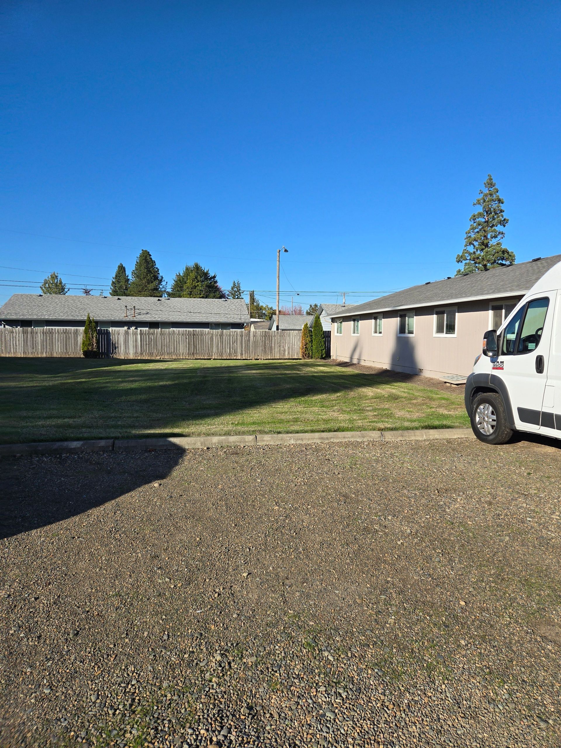 Jackson Duplexes in Albany Oregon – yard and side exterior of the property. 