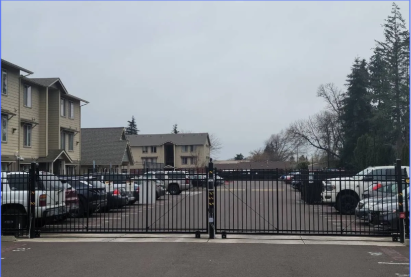 Aspen Place Apartments in Lebanon Oregon, near Western University of Health Sciences – gated community gate.