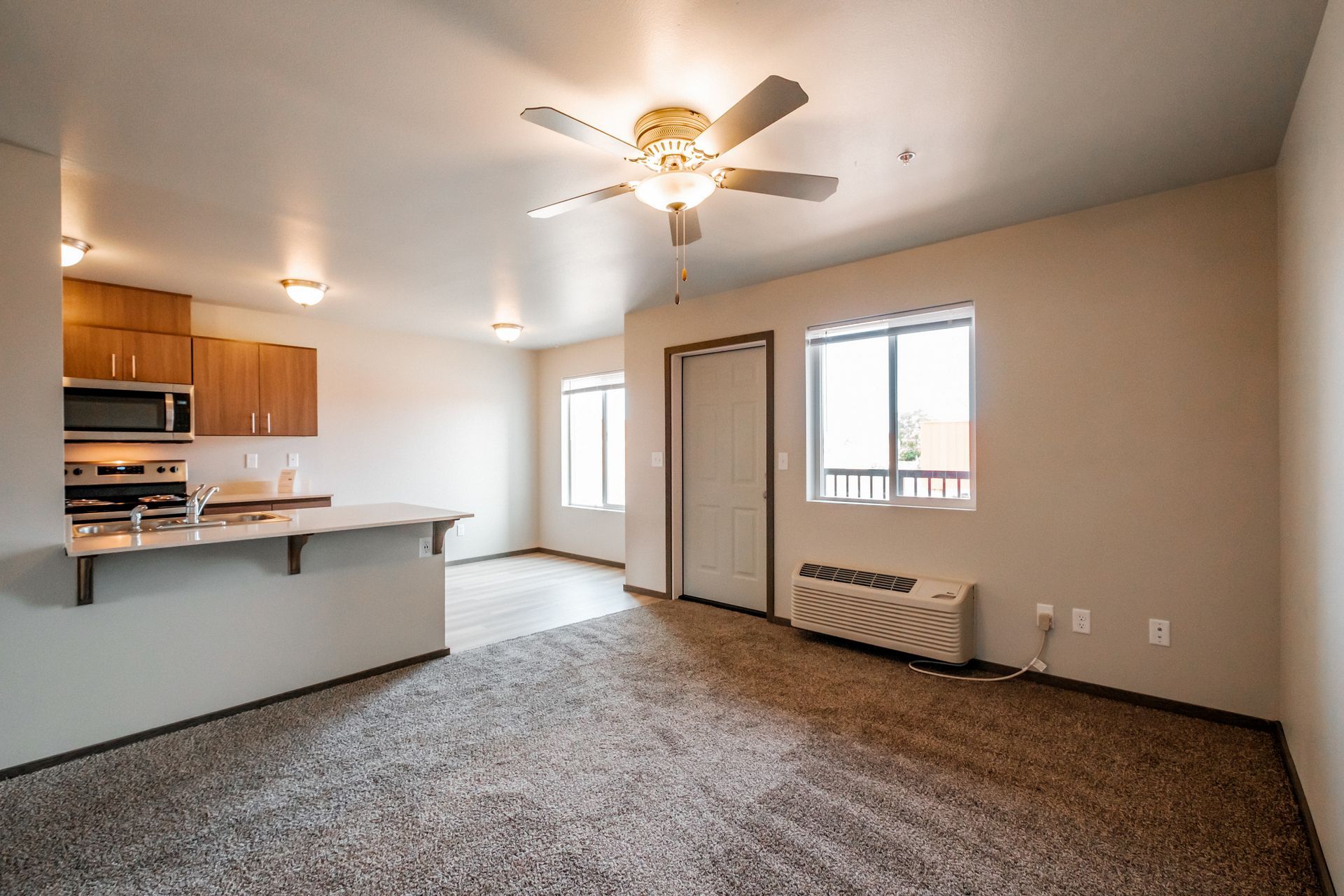 4 Corners Apartments in Salem Oregon, near Oregon State Capital - one-bedroom one-bathroom – living room, kitchen, back.