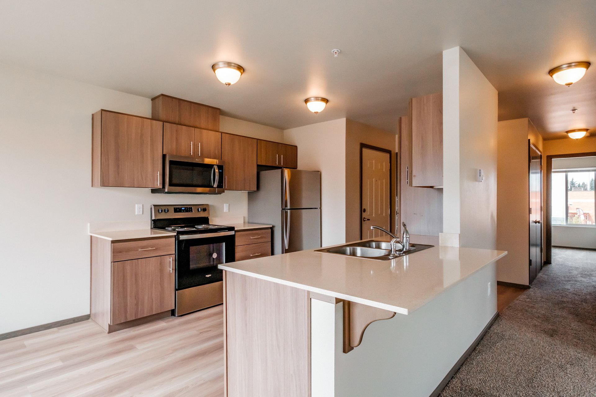 4 Corners Apartments in Salem Oregon, near Oregon State Capital - two-bedroom two-bathroom – kitchen sink, kitchen, hallway.