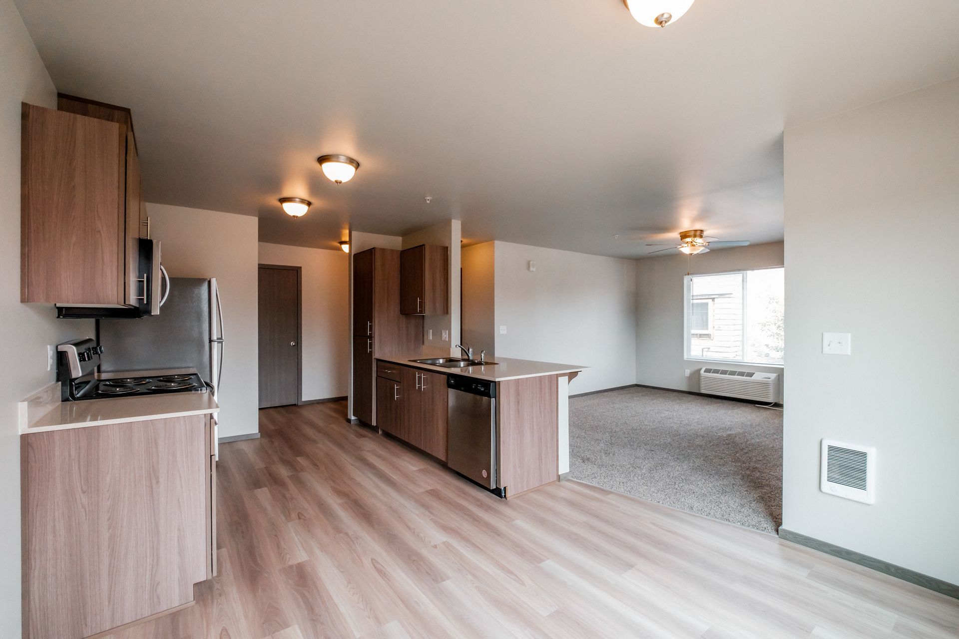 4 Corners Apartments in Salem Oregon, near Oregon State Capital - two-bedroom two-bathroom – kitchen and living room.