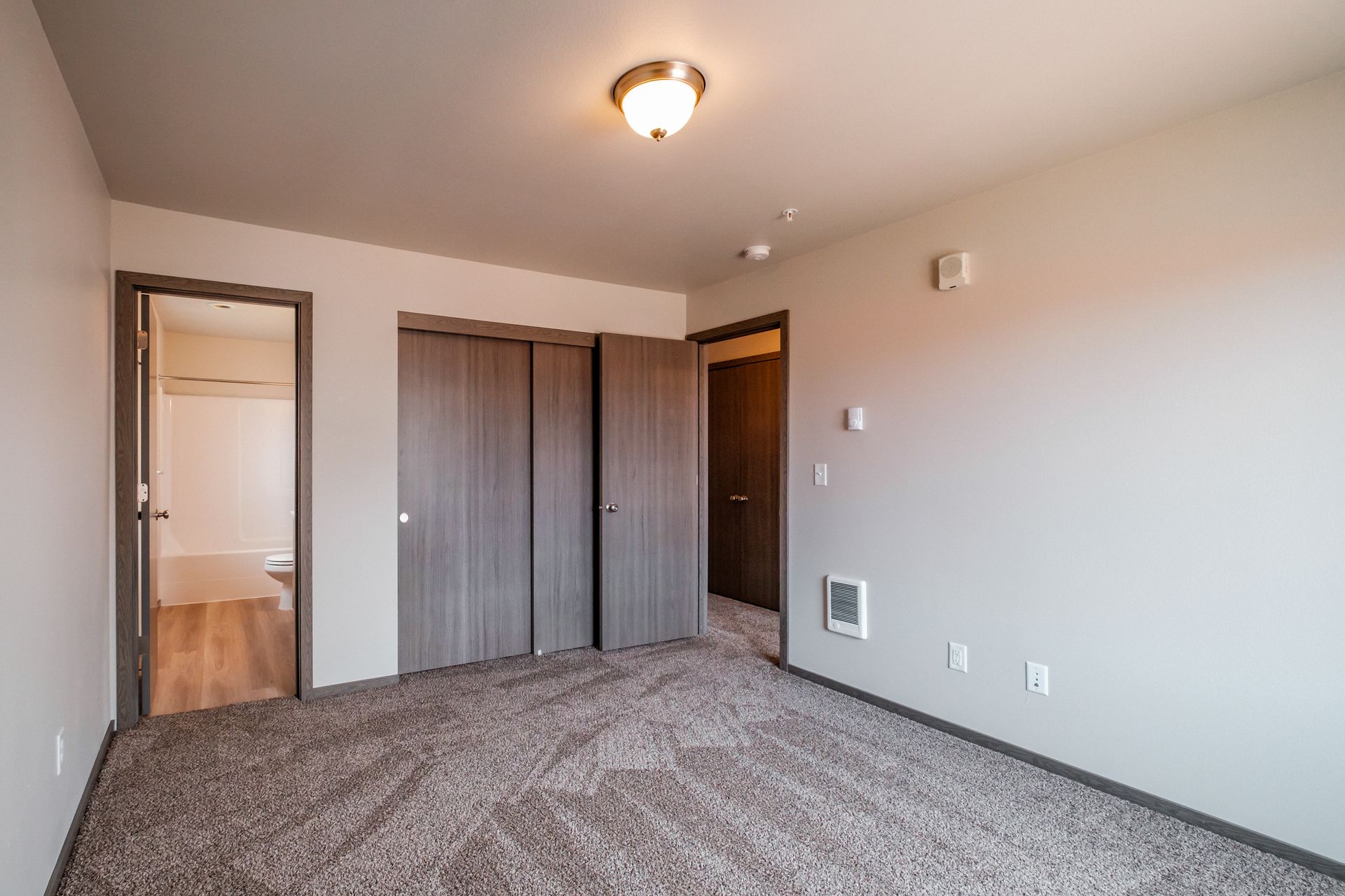 4 Corners Apartments in Salem Oregon, near Oregon State Capital - two-bedroom two-bathroom – master bedroom, closet, door.
