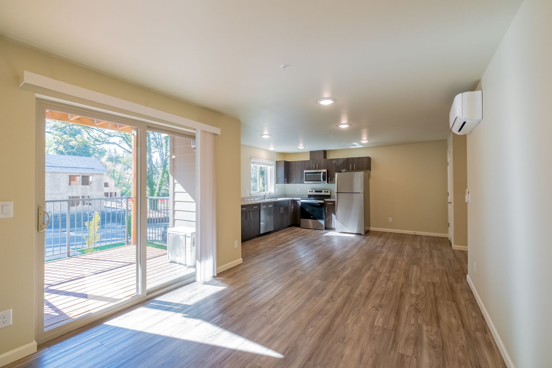 Harmona Heights Apartment community in South Salem Oregon, two-bedroom two-bathroom -sliding glass door, living room, kitchen