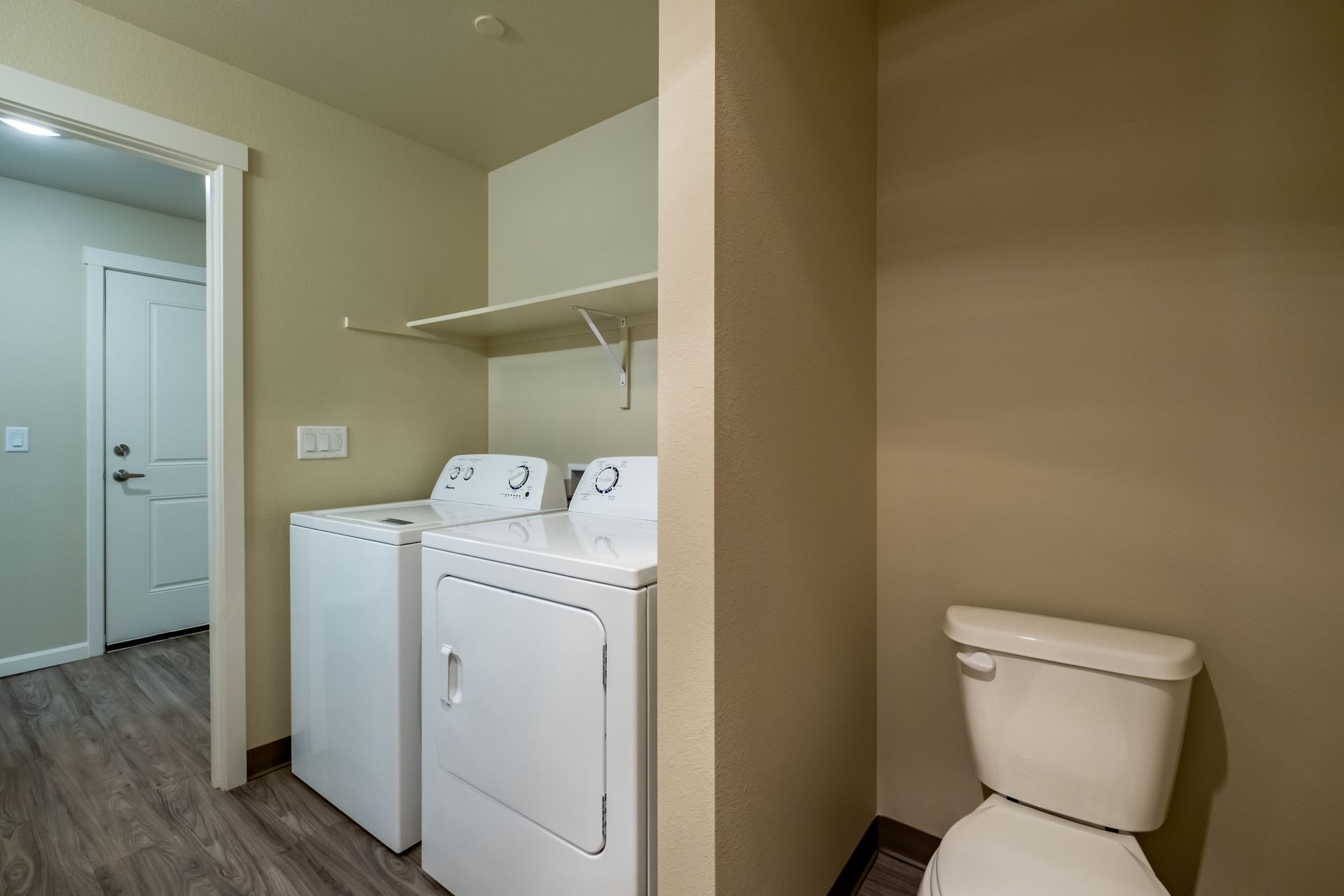 Harmona Heights Apartment community in South Salem Oregon, two-bedroom two-bathroom – washer, dryer and toilet.