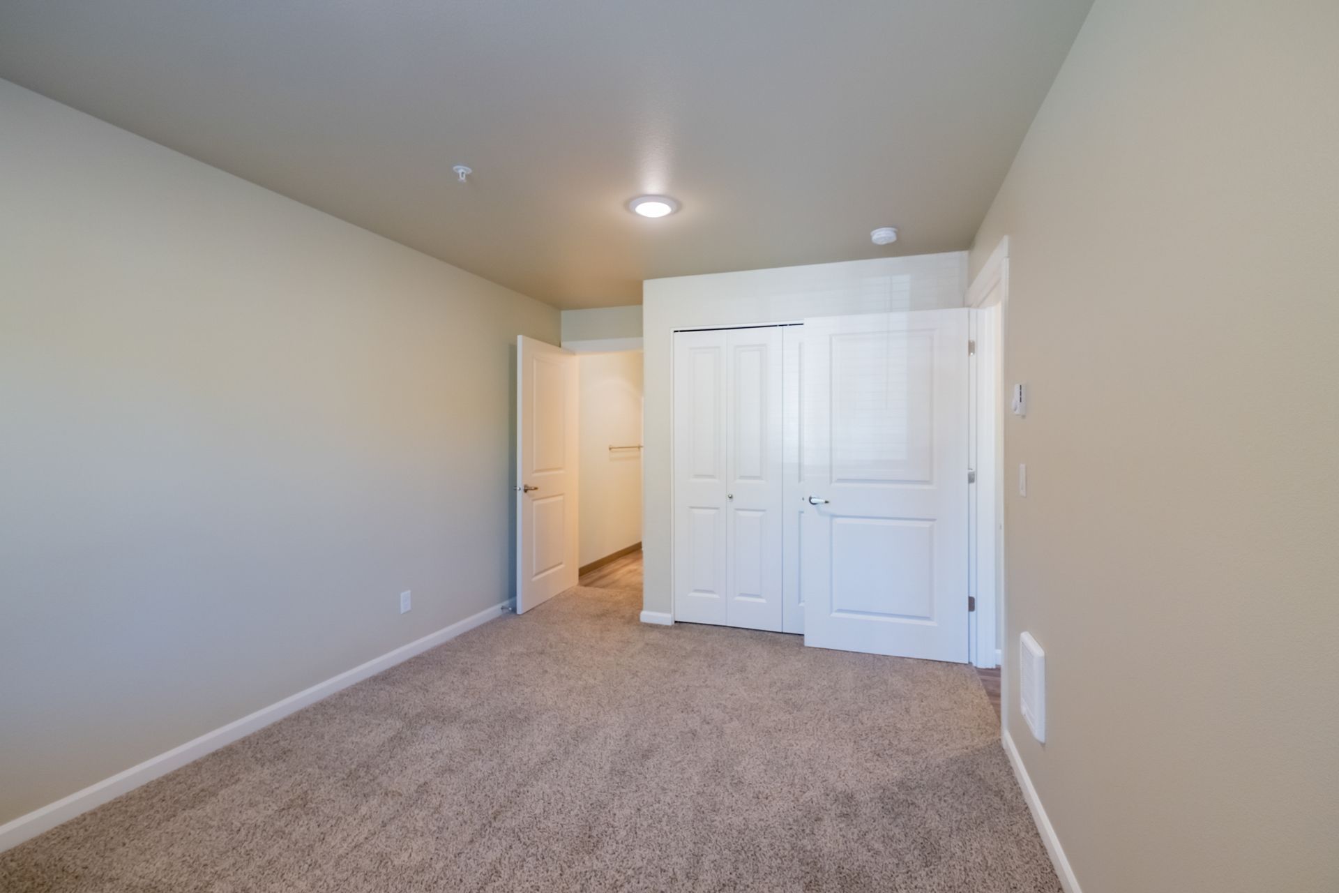 Harmona Heights Apartment community in South Salem Oregon, two-bedroom two-bathroom – master bedroom and bathroom.