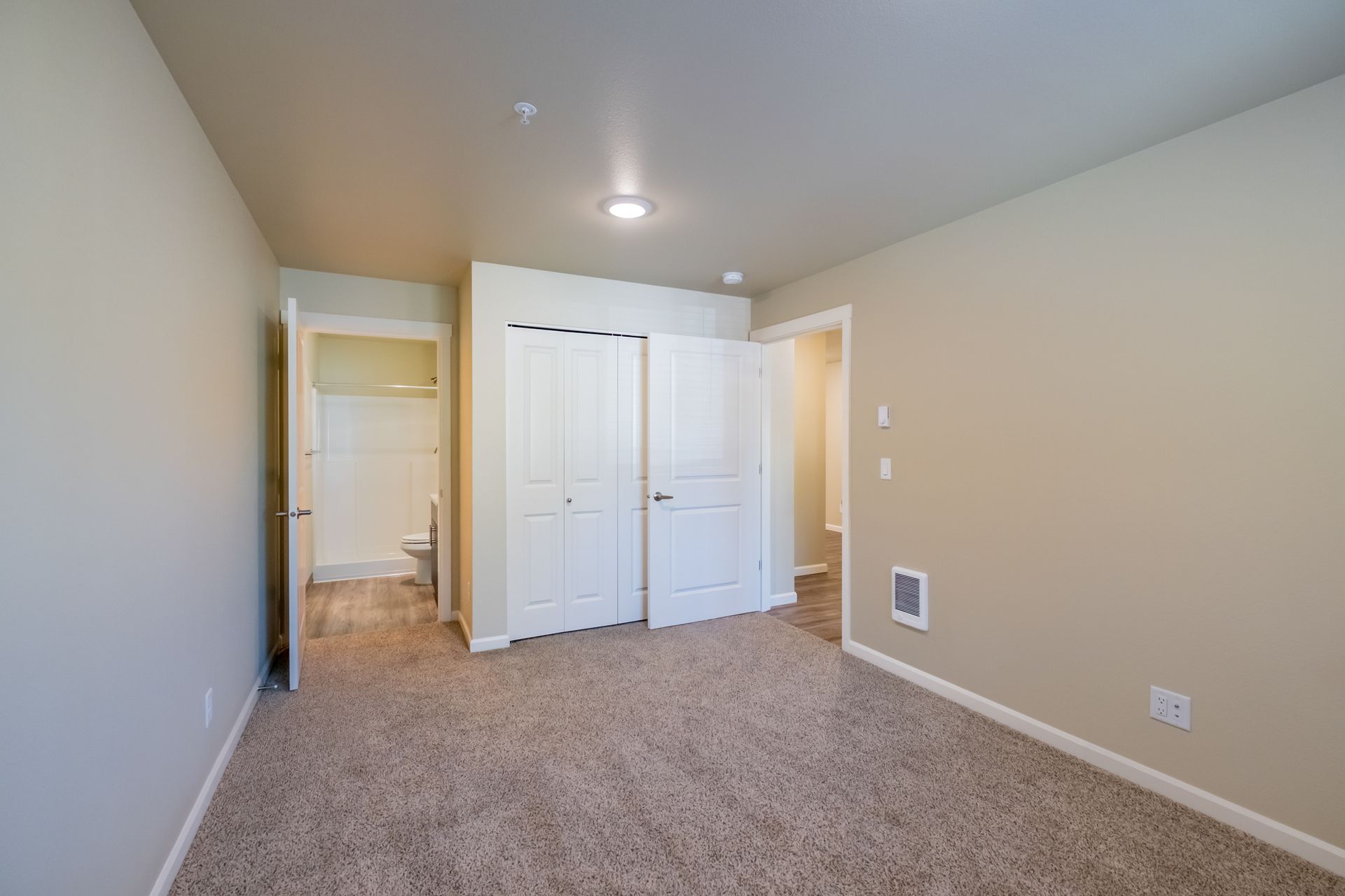 Harmona Heights Apartment community in South Salem Oregon, two-bedroom two-bathroom –master bedroom, bathroom closet and door