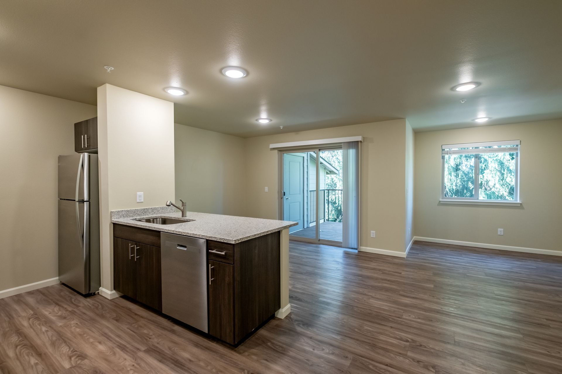 Harmona Heights Apartment community in South Salem Oregon, one-bedroom one-bathroom – kitchen and living room.