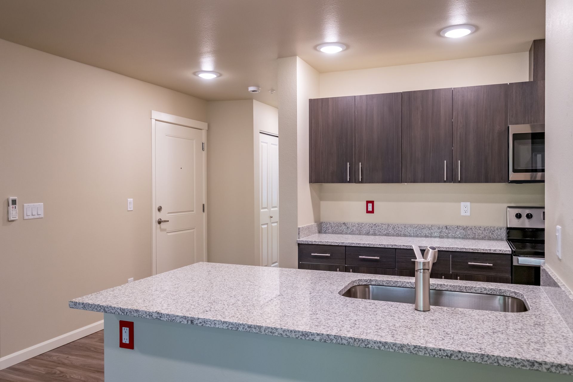 Harmona Heights Apartment community in South Salem Oregon, one-bedroom one-bathroom – kitchen sink cabinetry.