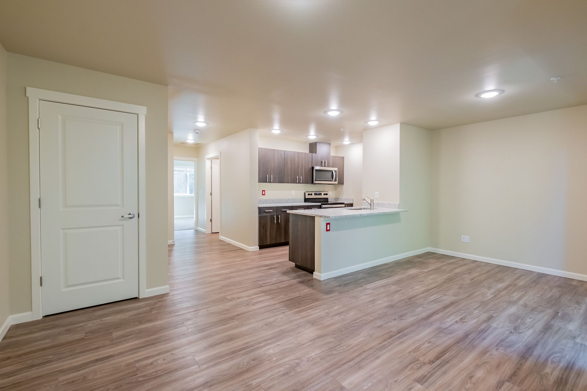 Harmona Heights Apartment community in South Salem Oregon, one-bedroom one-bathroom – kitchen and living room.