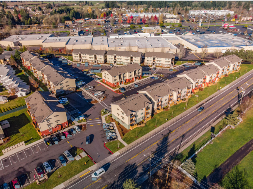 Lafayette Place Apartments in McMinnville, Oregon, near Linfield University –apartment home community and parking aerial view
