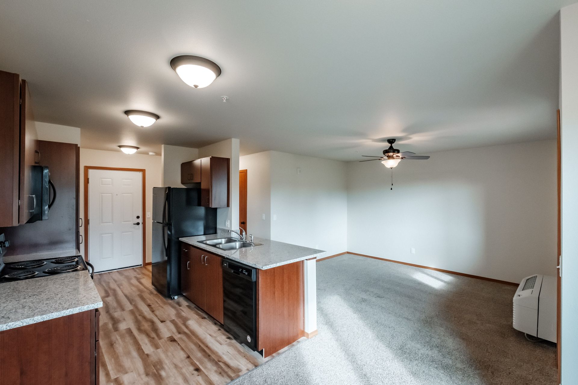 Oak Springs Apartments in Philomath Oregon, Near Oregon state University, one-bedroom one-bathroom – kitchen and living room.