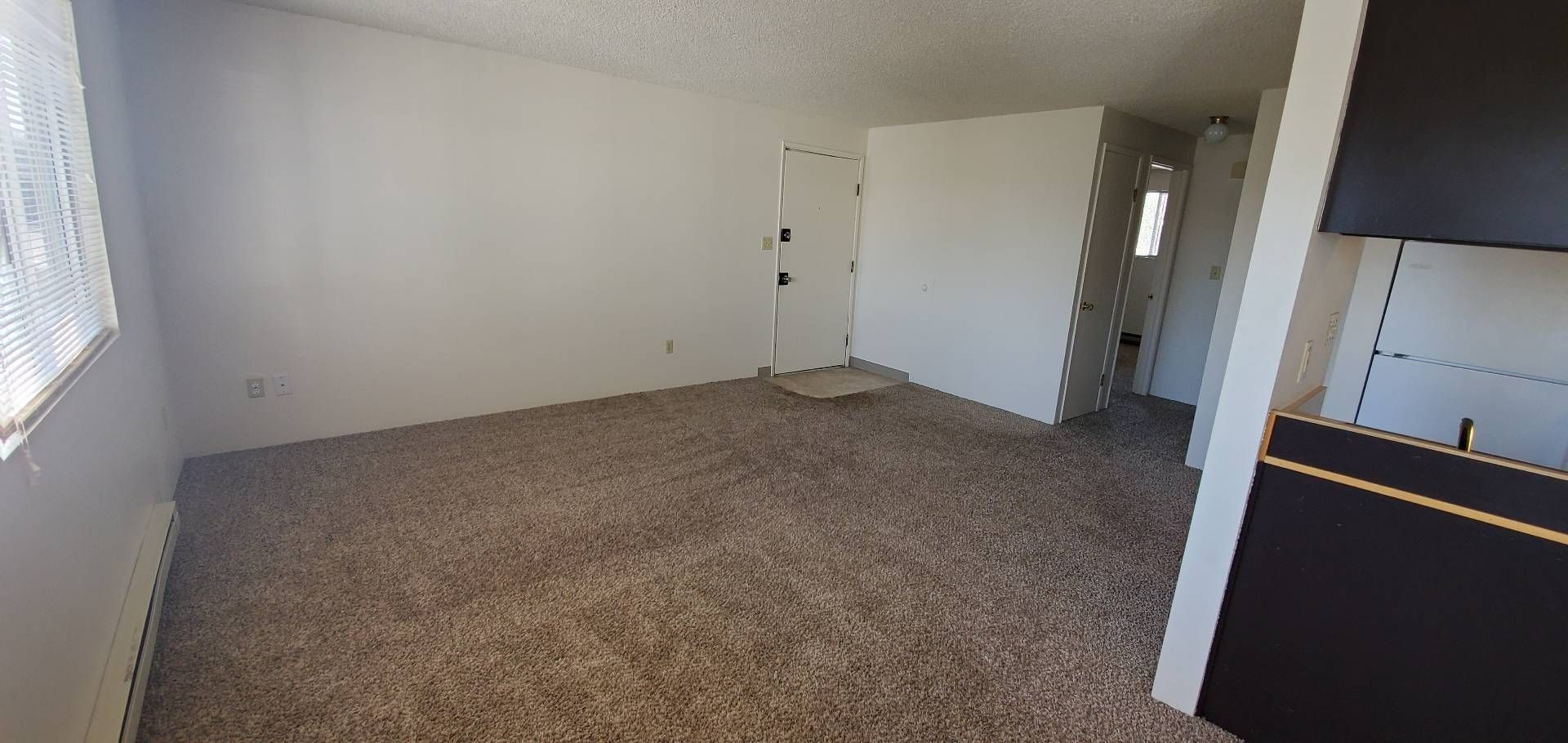 1061 Washington Apartments in Corvallis OR, Near Oregon State University, two-bedroom two-bathroom – living room, front door.