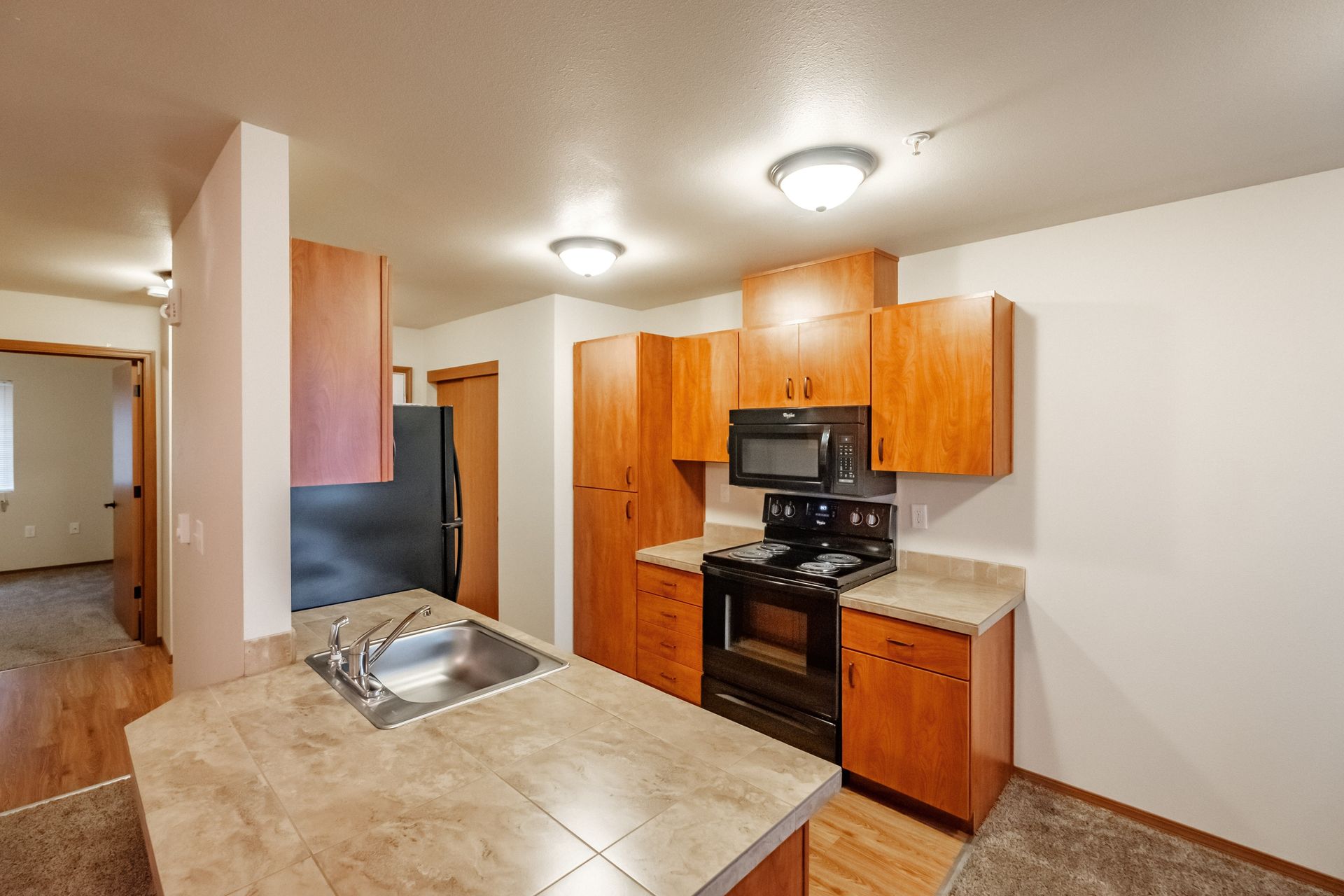 Lafayette Place Apartments in McMinnville, Oregon, near Linfield University – one-bedroom one-bath – kitchen stove, microwave