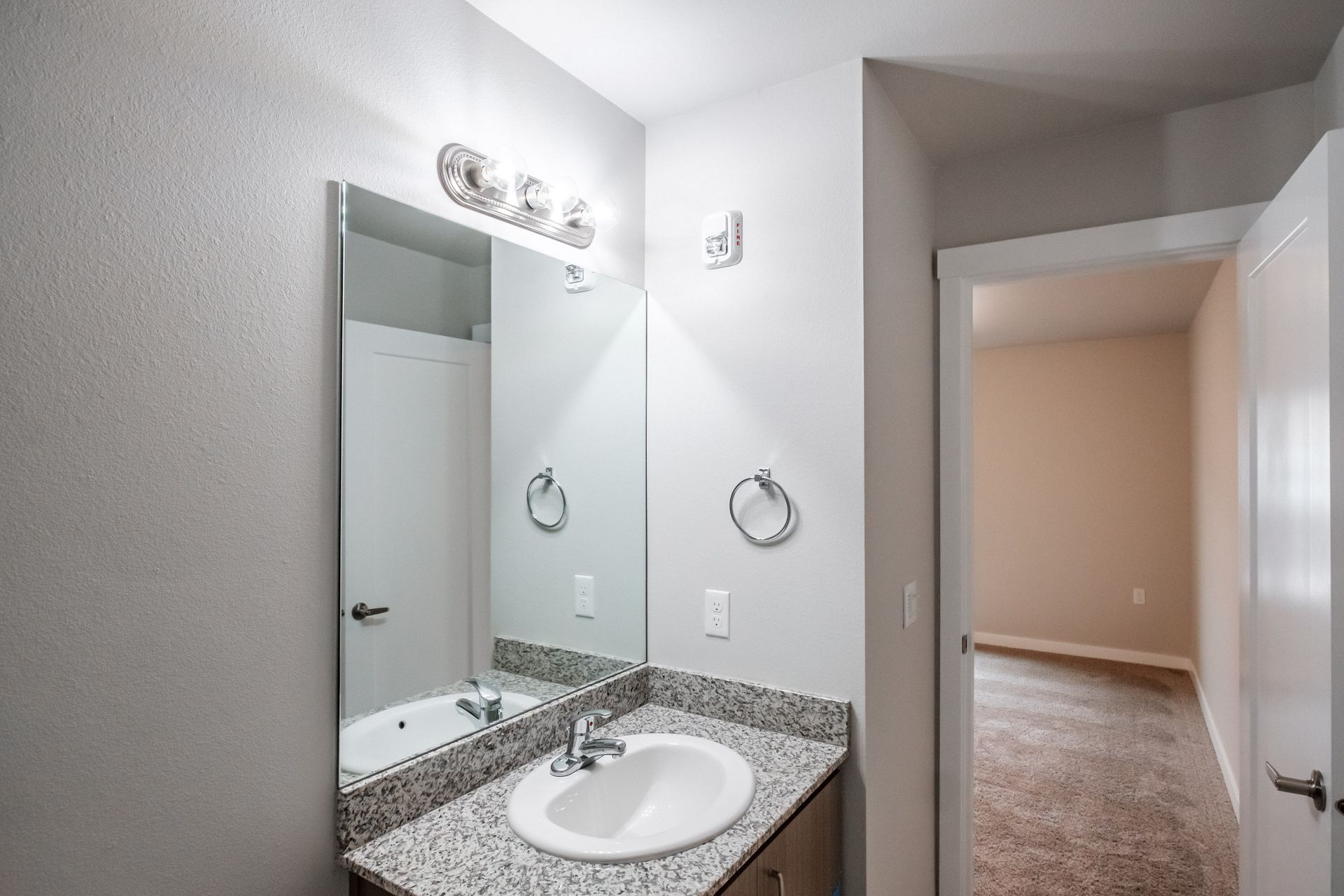 Evergreen Valley Apartments in McMinnville Oregon, near Linfield University – master bathroom sink and mirror – 1