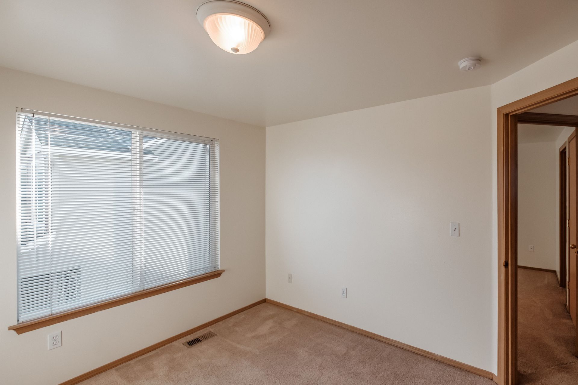 Mt. Vernon Town Homes in Albany Oregon, three-bedroom two and ½ bathroom – bedroom and window -2.
