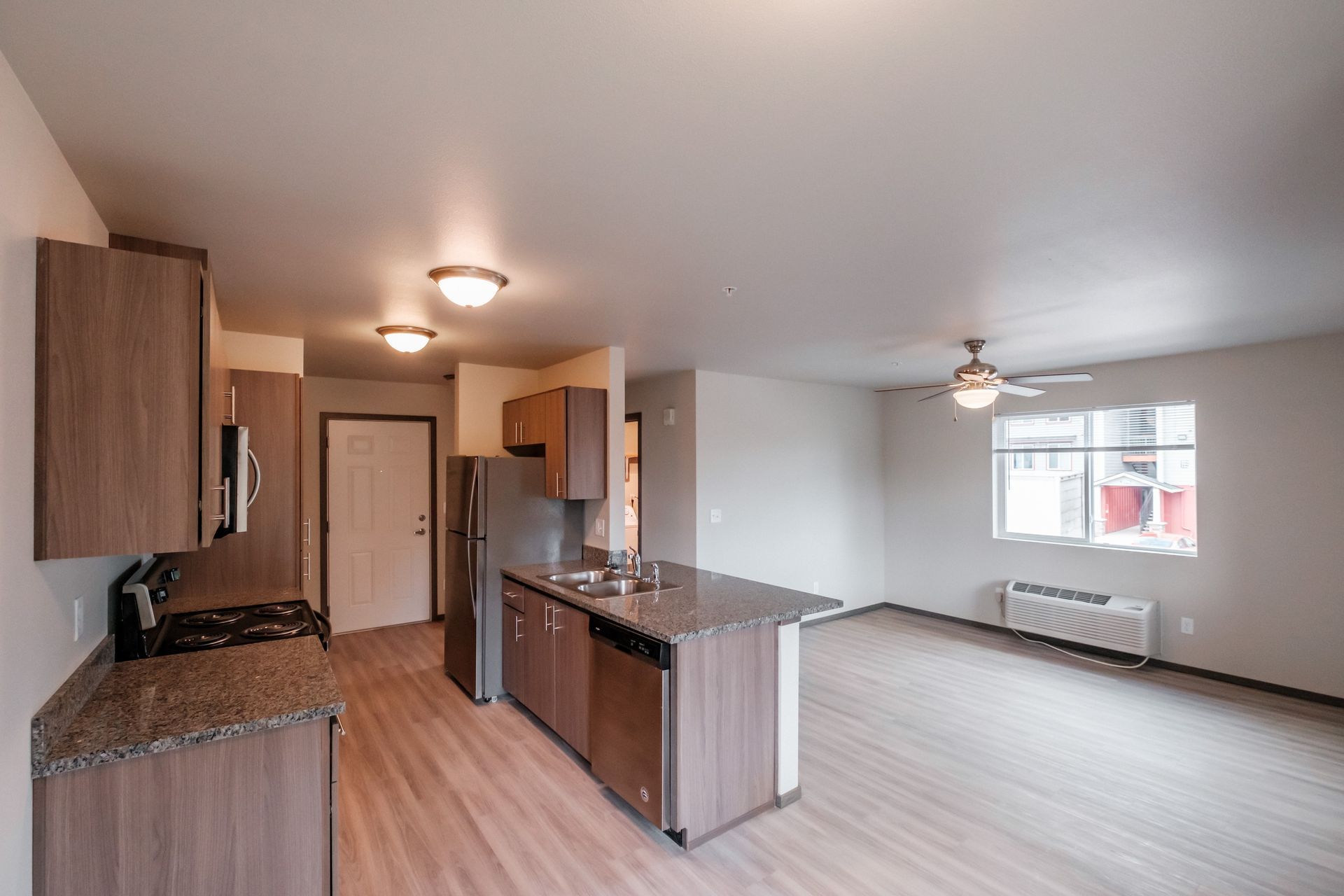 Cherry Glen Apartments in Salem Oregon – one bedroom one bathroom apartment home kitchen and living room.