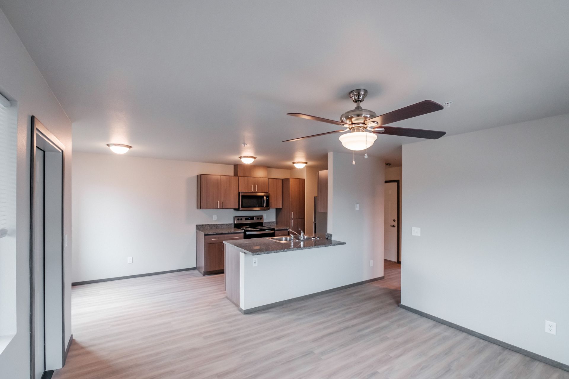 Cherry Glen Apartments in Salem Oregon – one bedroom one bathroom apartment home living room and kitchen - 2.