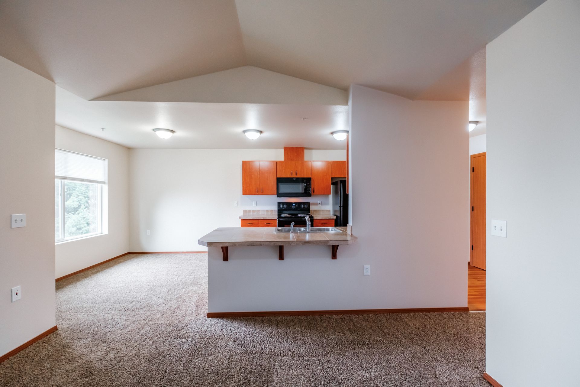 Aspen Place Apartments in Lebanon OR, near Western University of Health Sciences two-bed two-bath –living room to dining room