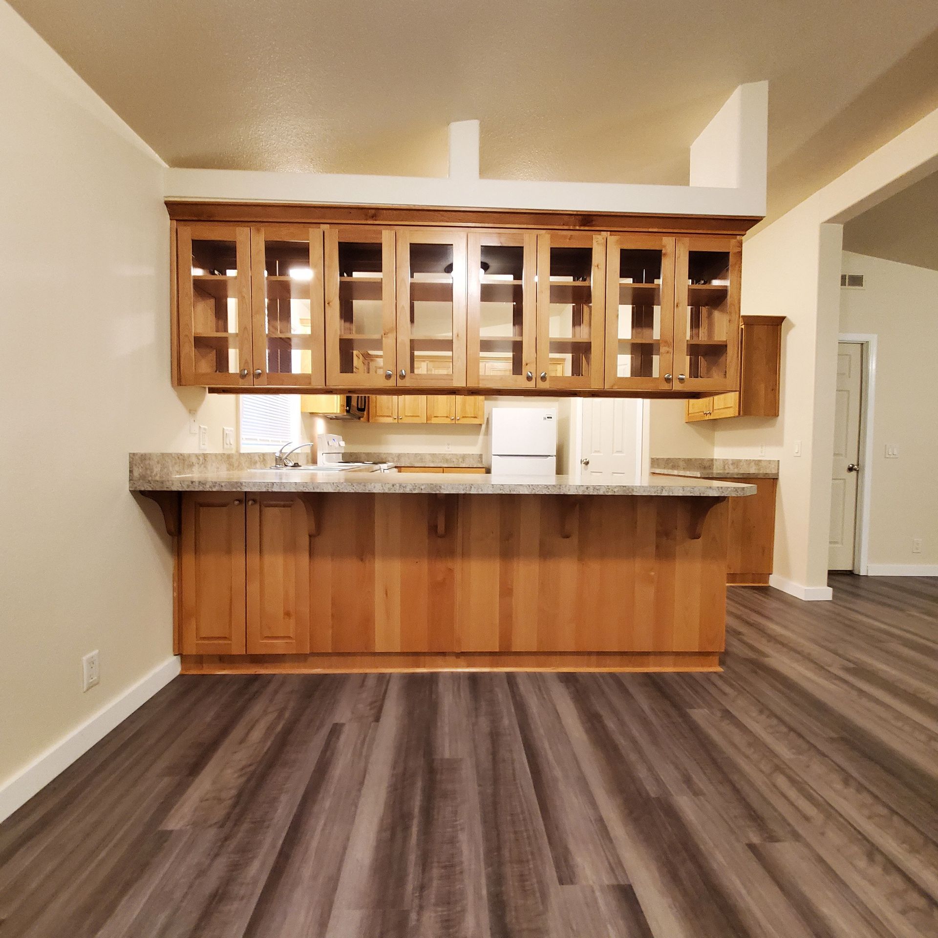 Ashwood Estates mobile homes in Tangent Oregon, four-bedroom two-bathroom – kitchen cabinets.