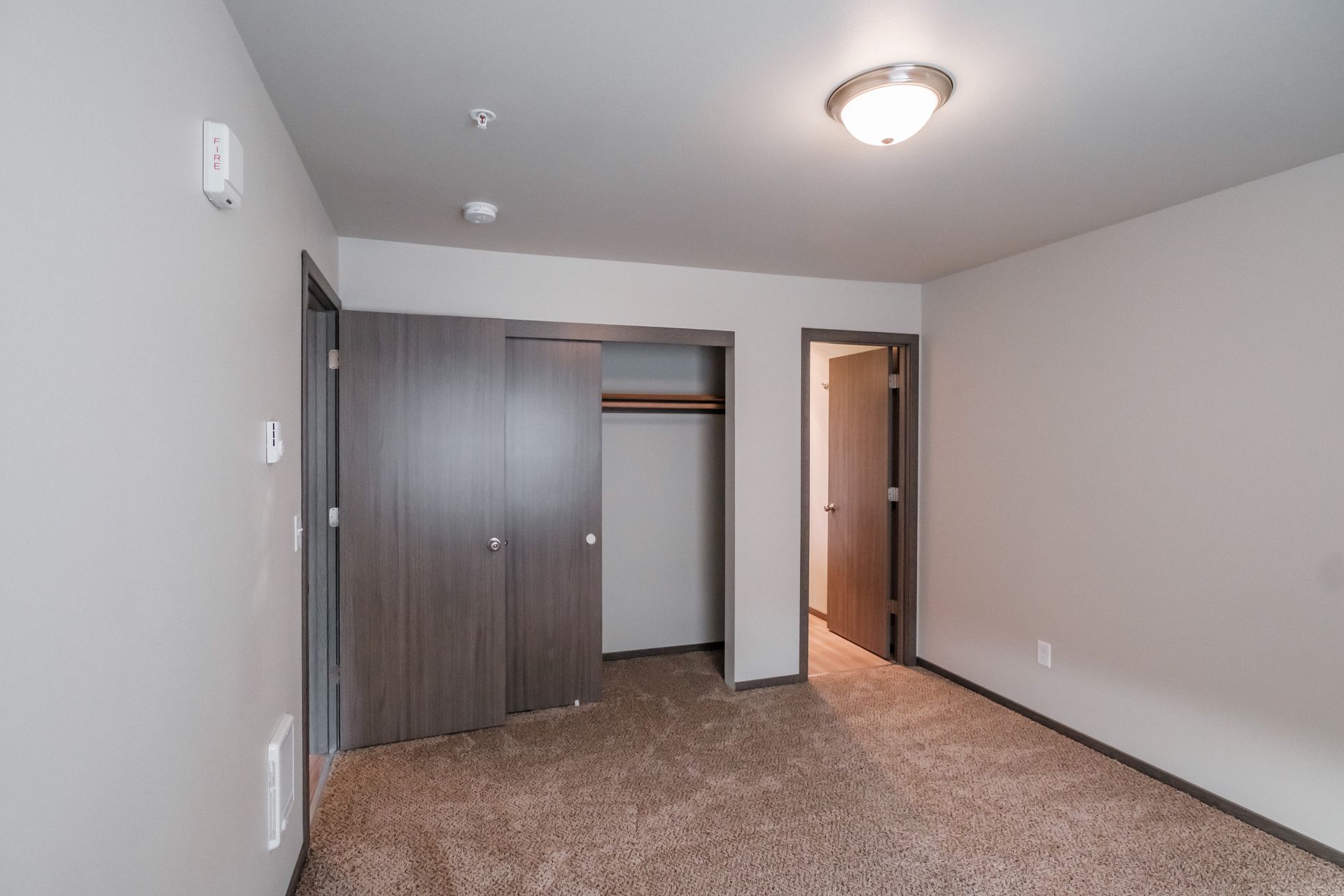 Cherry Glen Apartments in Salem Oregon – two-bedroom two-bathroom apartment home bedroom and closet - 1