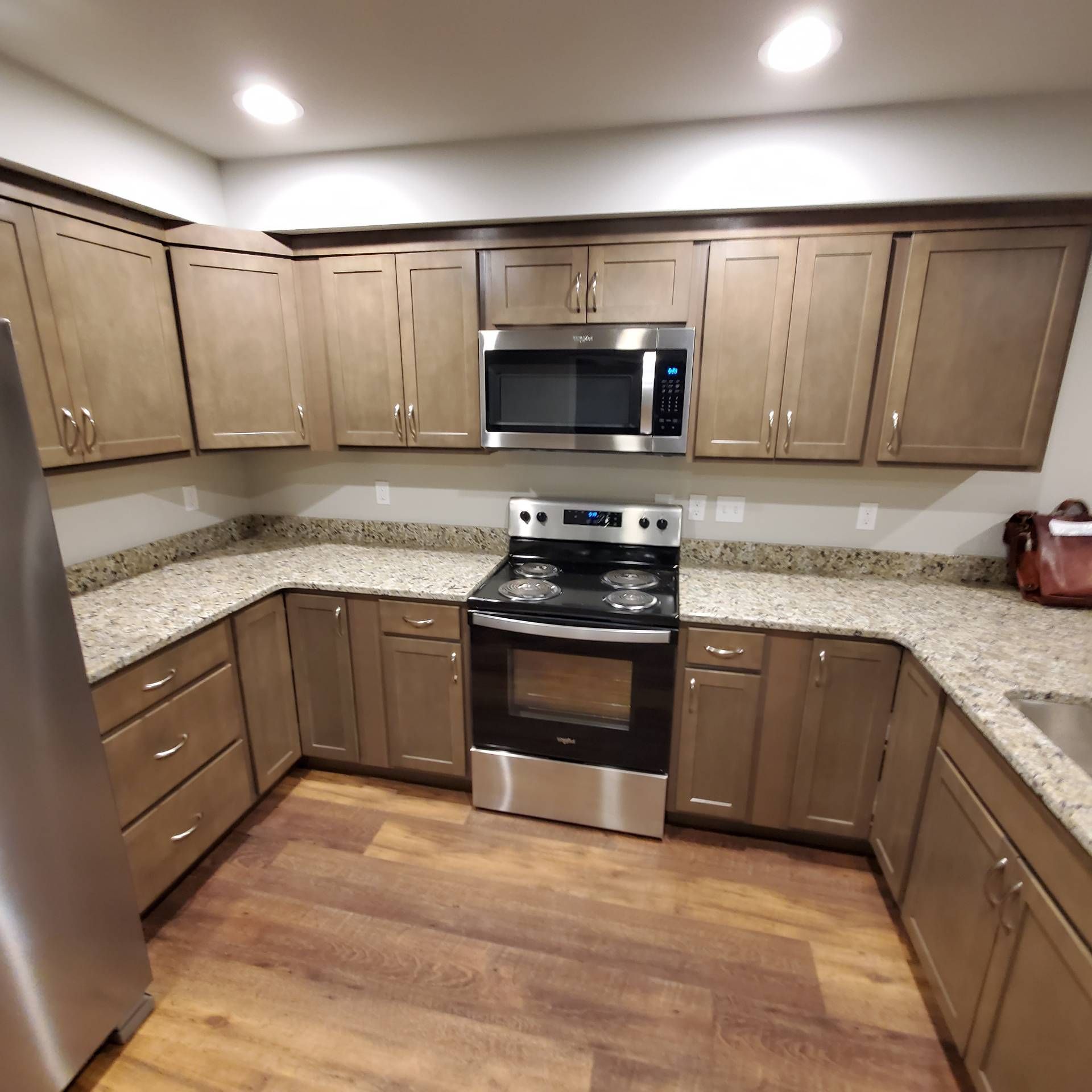 Rye Street Town Homes in Albany, OR. Two Bedroom, Two and 1/2 Bathroom – kitchen, stove, microwave, refrigerator.