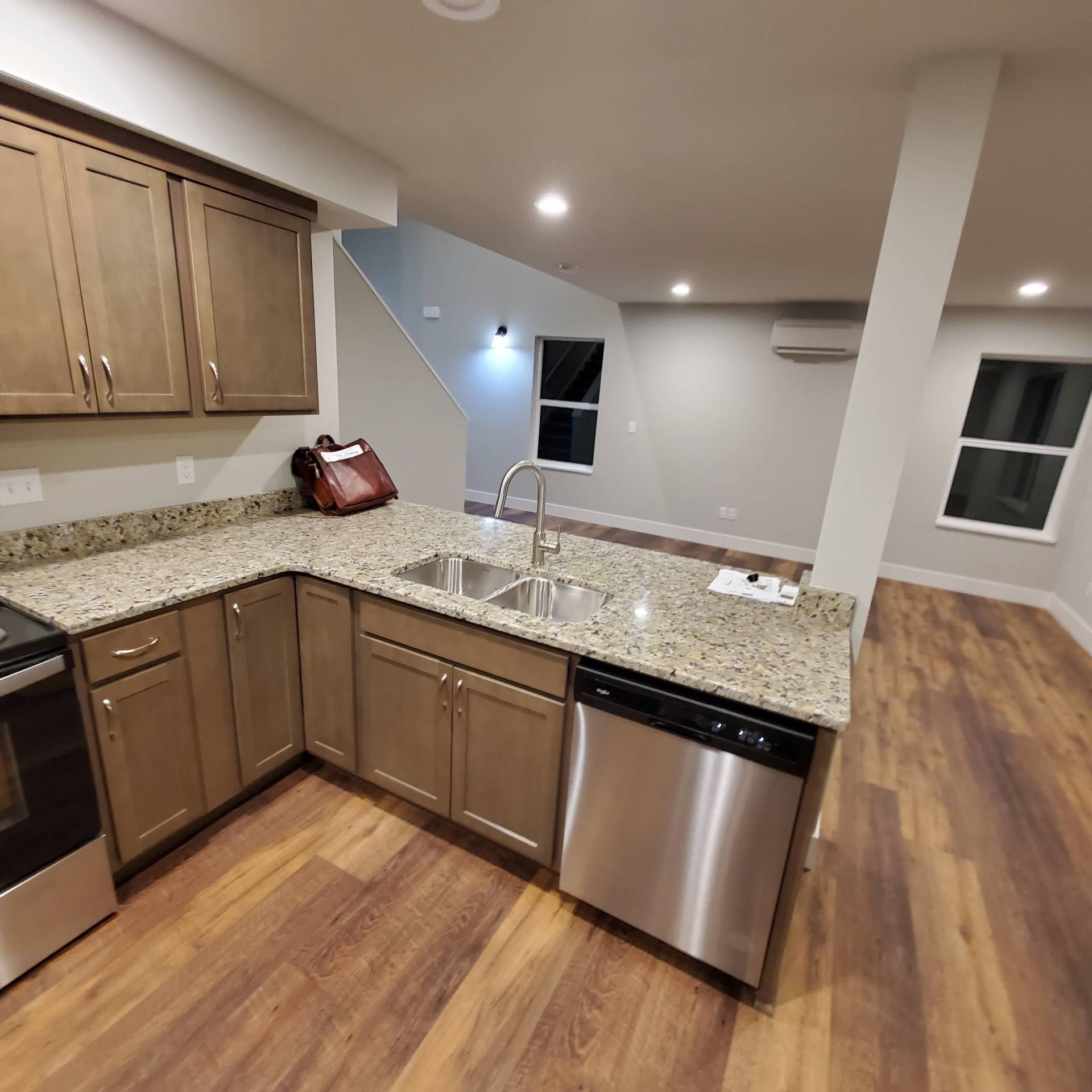 Rye Street Town Homes in Albany, OR. Two Bedroom, Two and 1/2 Bathroom – kitchen sink and living room.