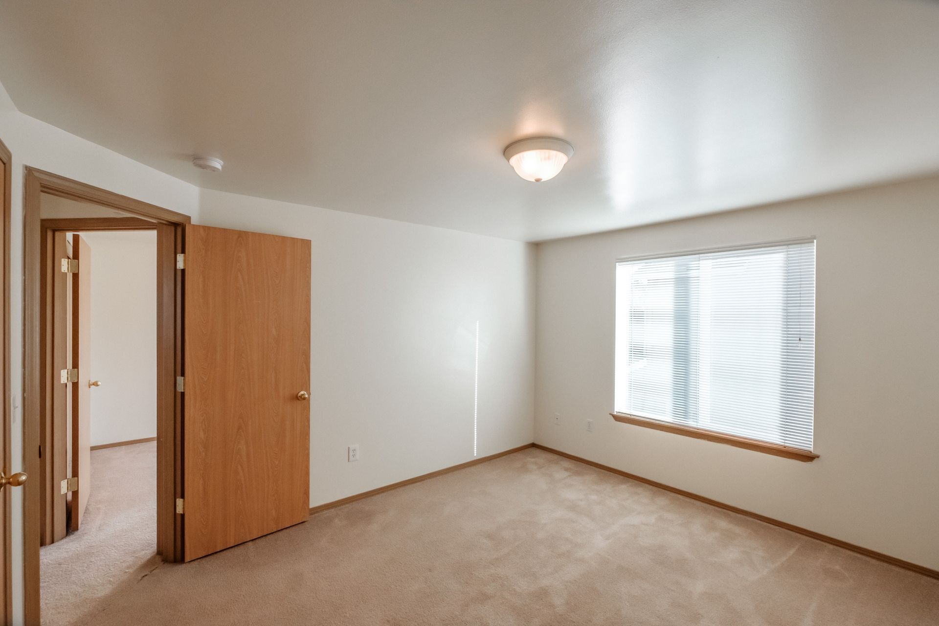 Mt. Vernon Town Homes in Albany Oregon, three-bedroom two and ½ bathroom – bedroom and window -1.