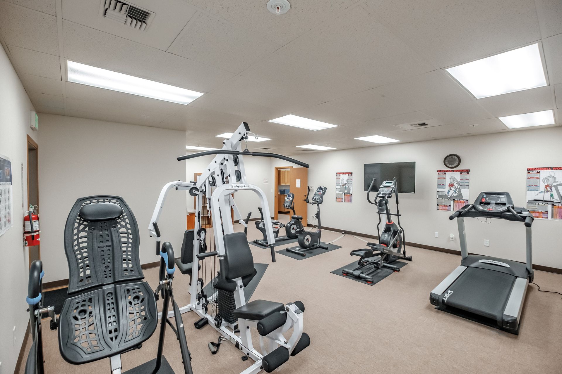 Lafayette Place Apartments in McMinnville, Oregon, near Linfield University – apartment community clubhouse fitness center.