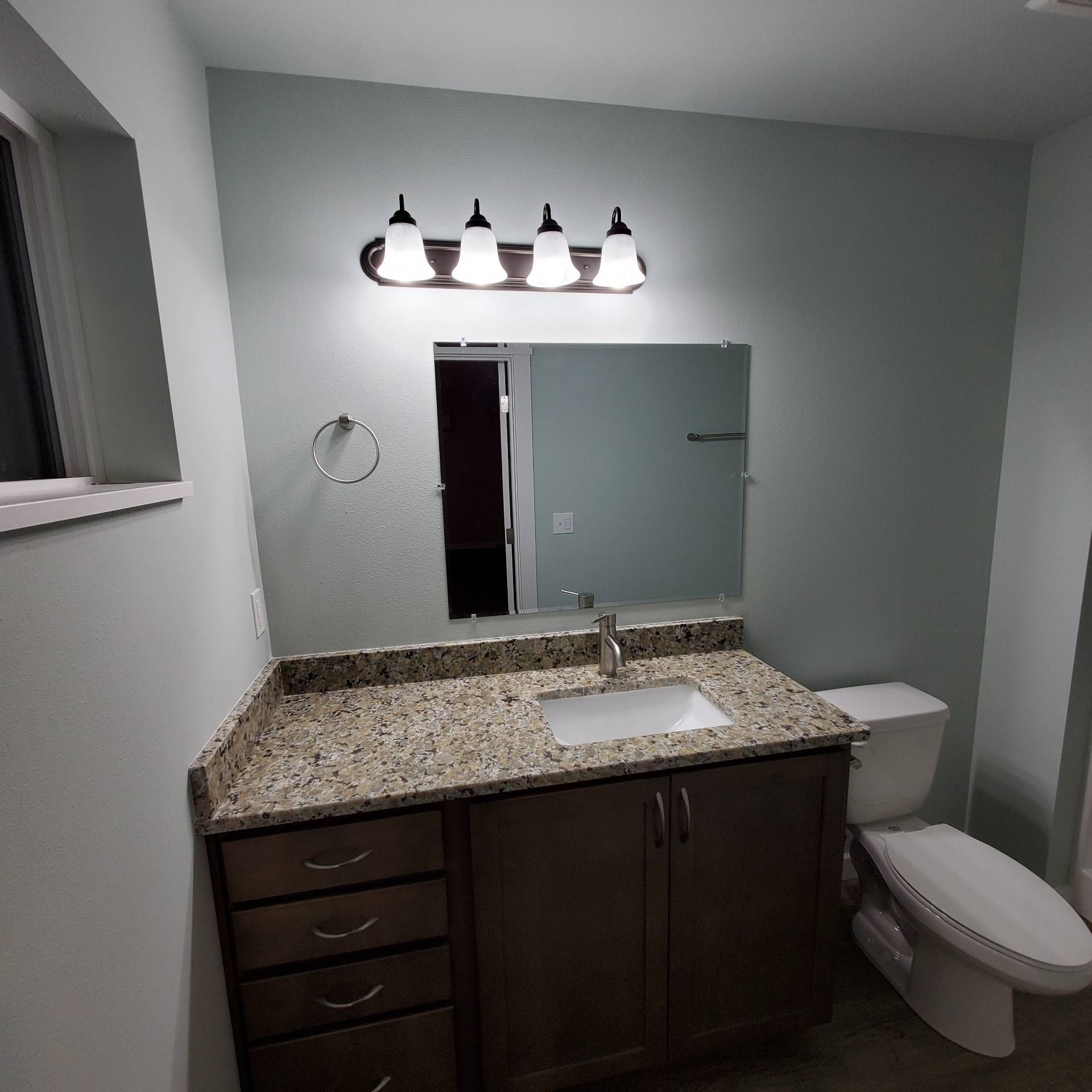 Rye Street Town Homes in Albany, OR. Two Bedroom, Two and 1/2 Bathroom – bathroom sink and toilet -2.