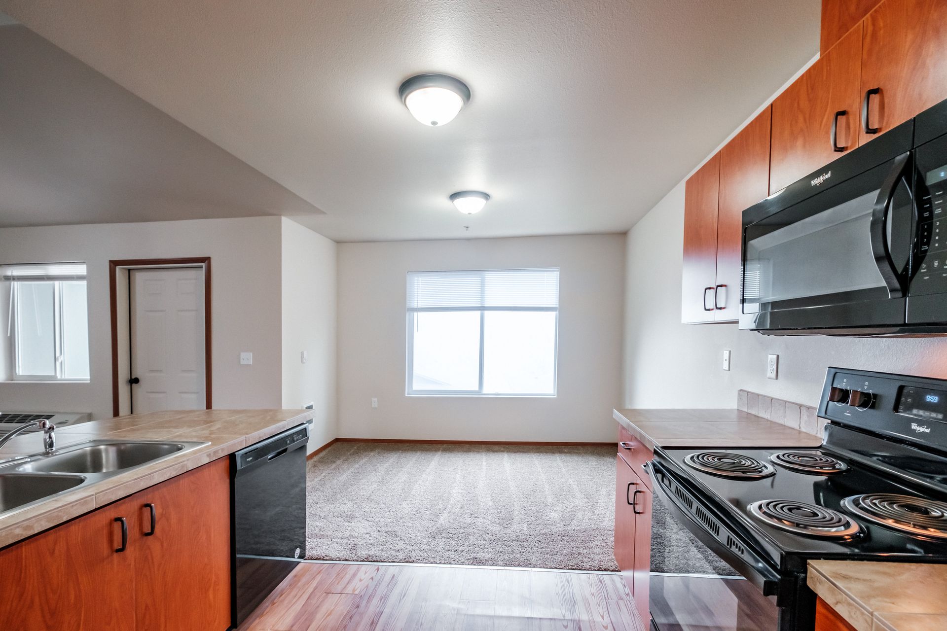 Aspen Place Apartments in Lebanon OR, near Western University of Health Sciences, two-bed two-bath – kitchen to dining room.