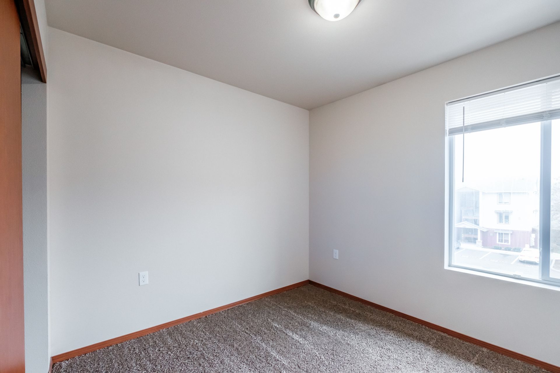 Aspen Place Apartments in Lebanon OR, near Western University of Health Sciences, two-bed two-bath –bedroom window -1.