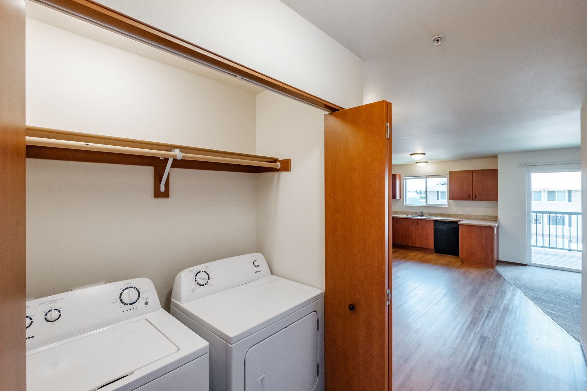 Newcastle Place Apartments in Salem, OR Near Chemeketa Community College, two-bedroom, two-bath – washer, dryer, living room.