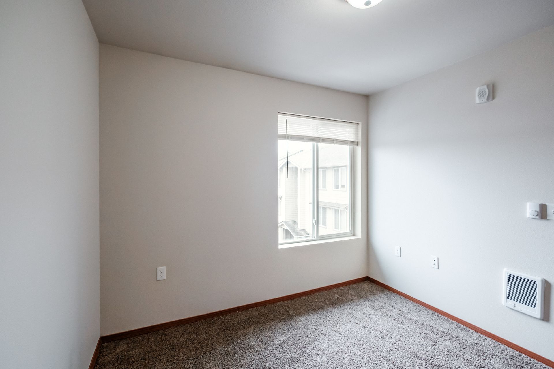 Aspen Place Apartments in Lebanon OR, near Western University of Health Sciences, two-bed two-bath – master bedroom window.