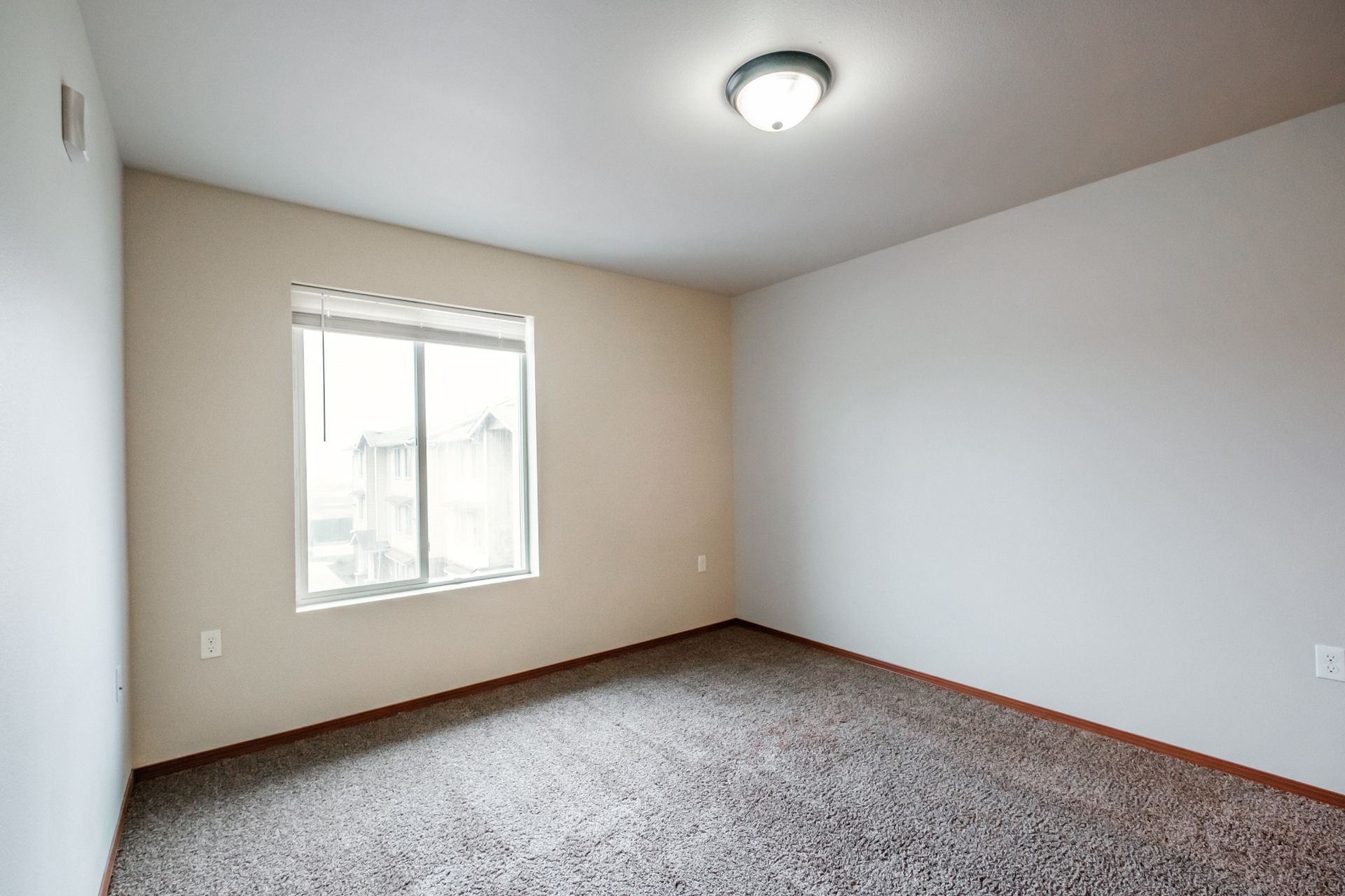 Aspen Place Apartments in Lebanon OR, near Western University of Health Sciences, two-bed two-bath – master bedroom window.