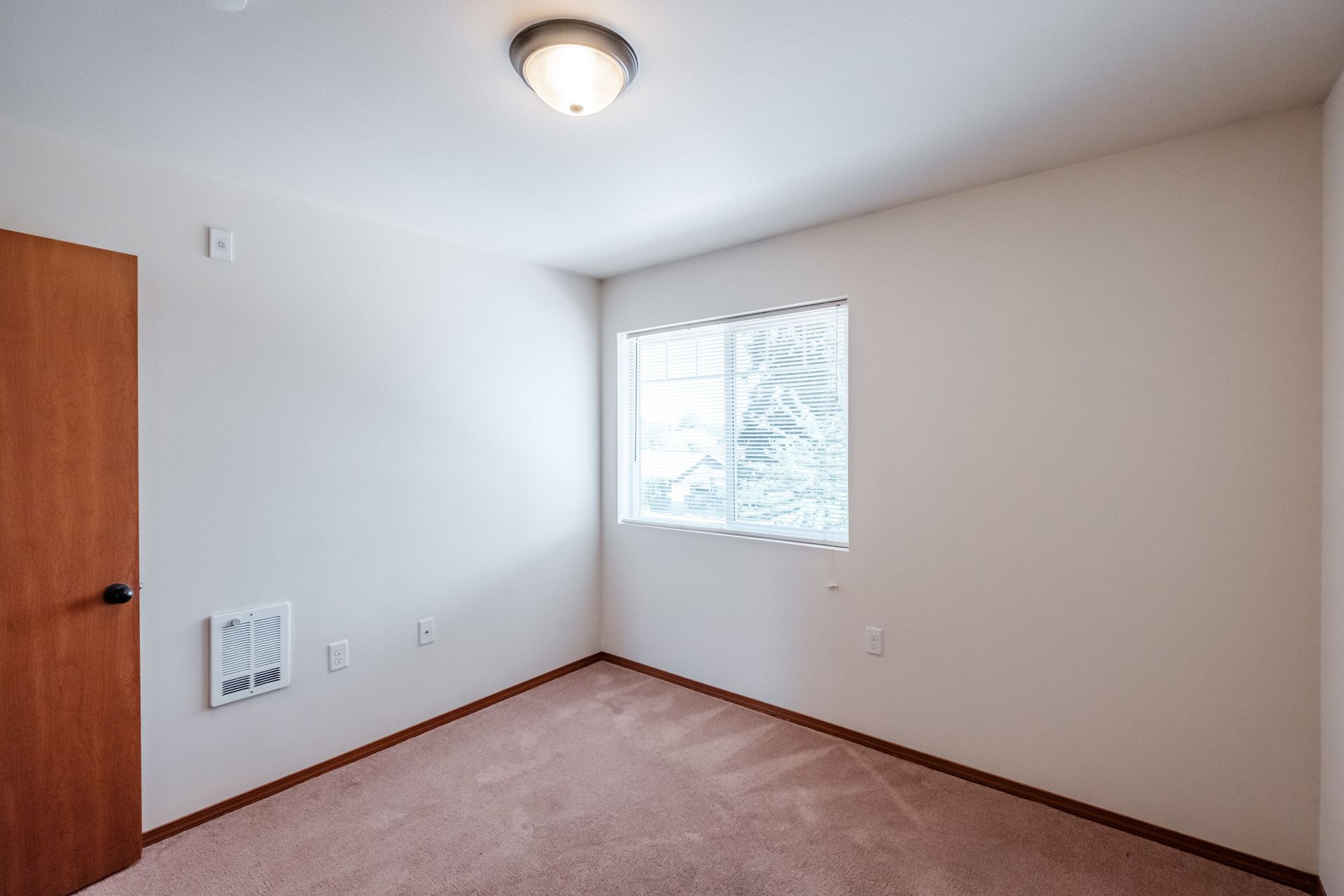 Newcastle Place Apartments in Salem, OR Near Chemeketa Community College, two-bedroom, two-bath – bedroom window, closet -2.