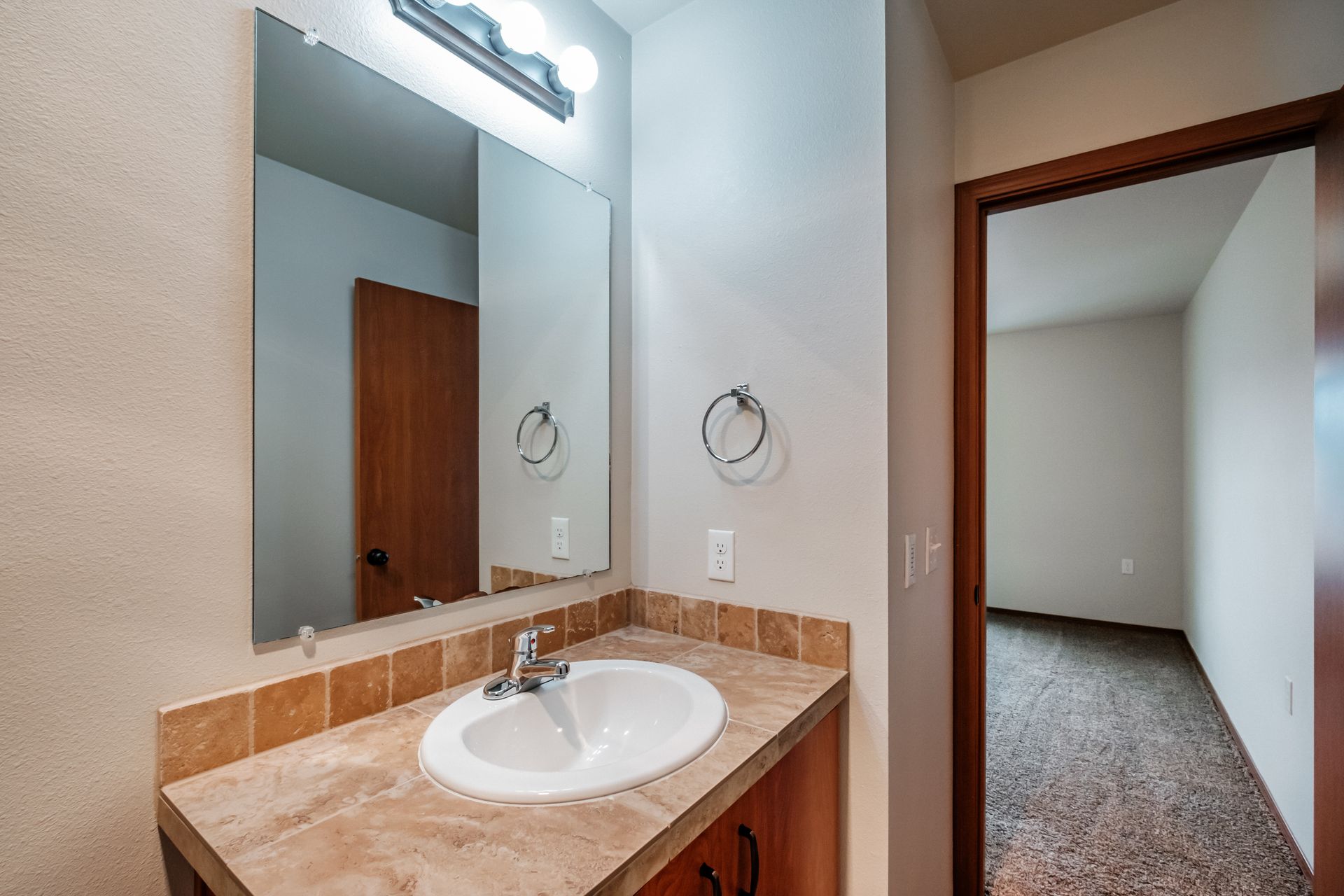 Aspen Place Apartments in Lebanon OR, near Western University of Health Sciences, two-bed two-bath –sink and mirror -1.