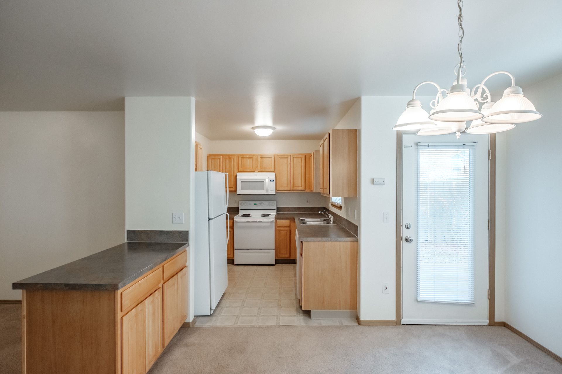 Mt. Vernon Town Homes – in Albany Oregon, two-bedroom two and ½ bathroom – Kitchen from dining room.